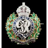 A gold and platinum, ruby, sapphire, emerald and diamond chip set Royal Engineers brooch, height