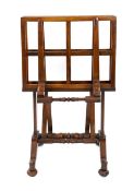 An early Victorian rosewood folio stand, with ratcheting mechanism adjusting to seven different