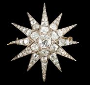 A Victorian gold, silver and graduated old cut diamond set starburst brooch, the central stone