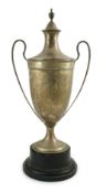 A George V silver two handled cup and cover by Sebastian Garrard, of vase form, with beaded loop