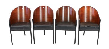 A set of four Philippe Starck Café Costes chairs, with tub shaped mahogany backs, integral leather