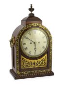 Davies & Napper. A Regency cut brass inlaid rosewood bracket clock, of arched architectural form,