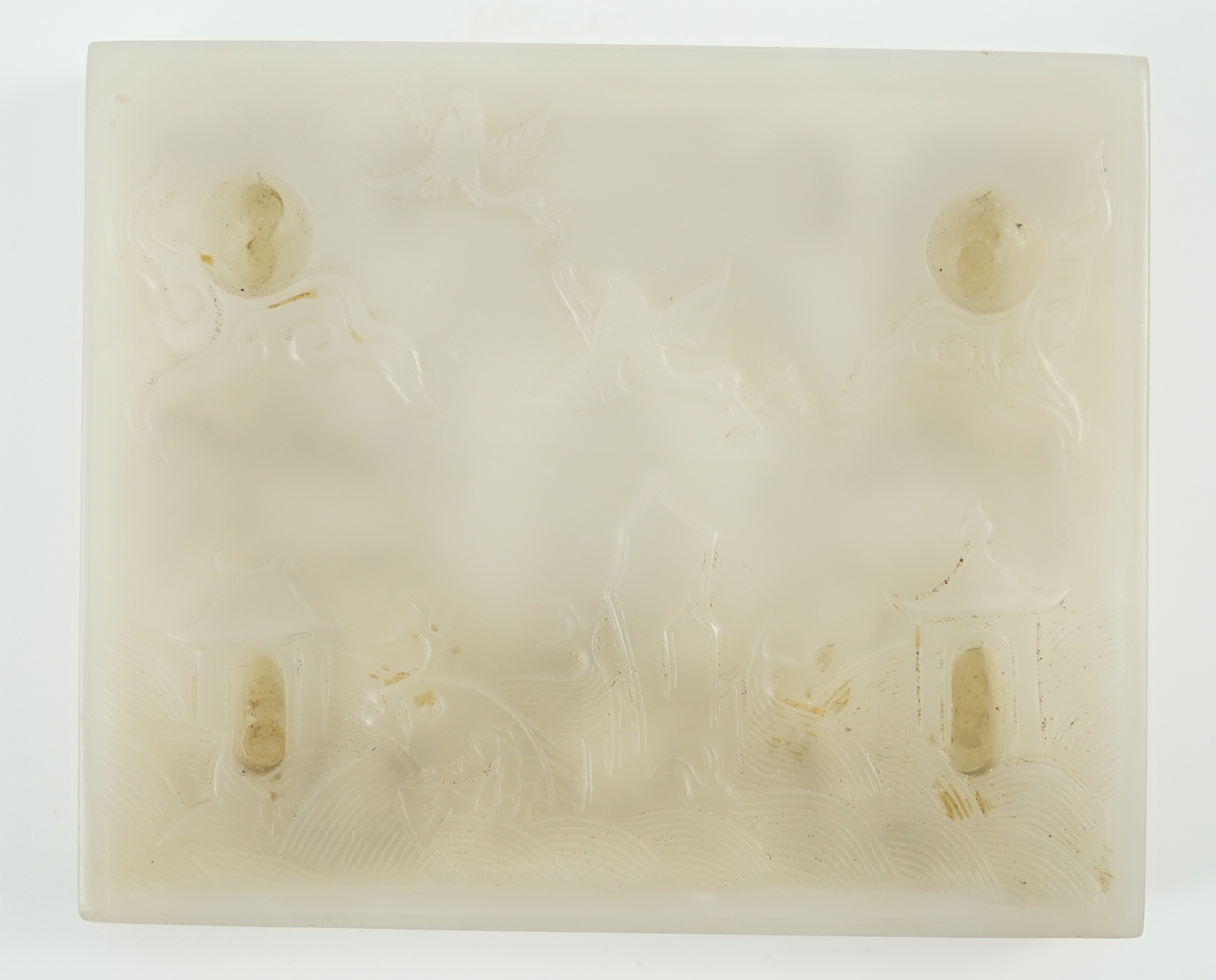 An unusual Chinese white jade plaque, 18th/19th century, carved in high relief with three seated - Image 3 of 4