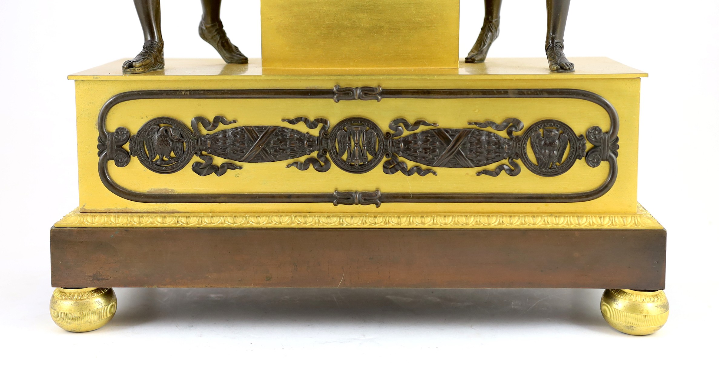 A 19th century French Louis XVI style bronze and ormolu mantel clock, surmounted with figures of - Image 3 of 5