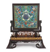 A Chinese cloisonné enamel, hardstone and mother-of-pearl mounted table screen, with pierced and