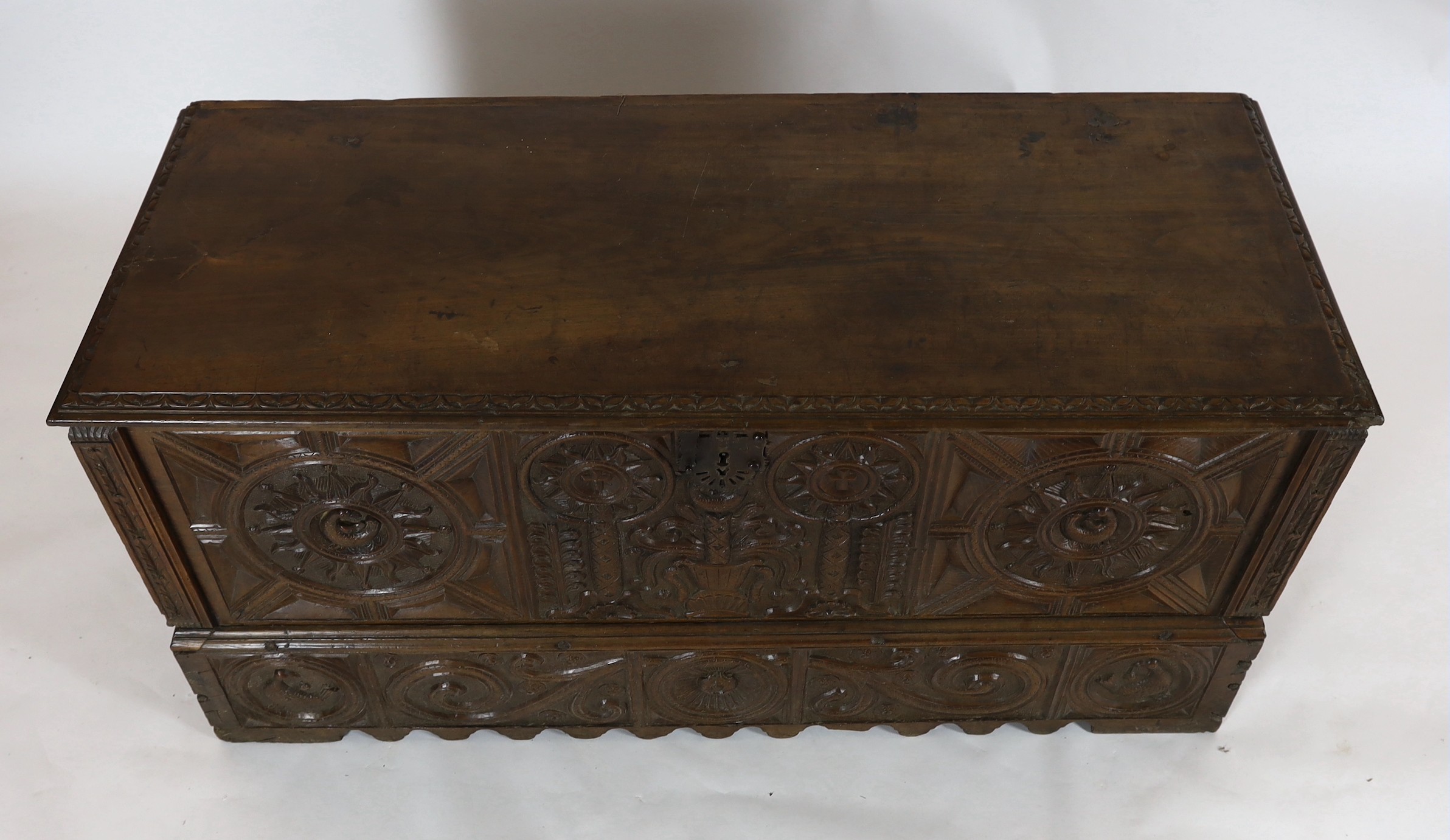 An 18th century Spanish chestnut coffer, carved in relief with a central fountain flanked by - Image 3 of 4