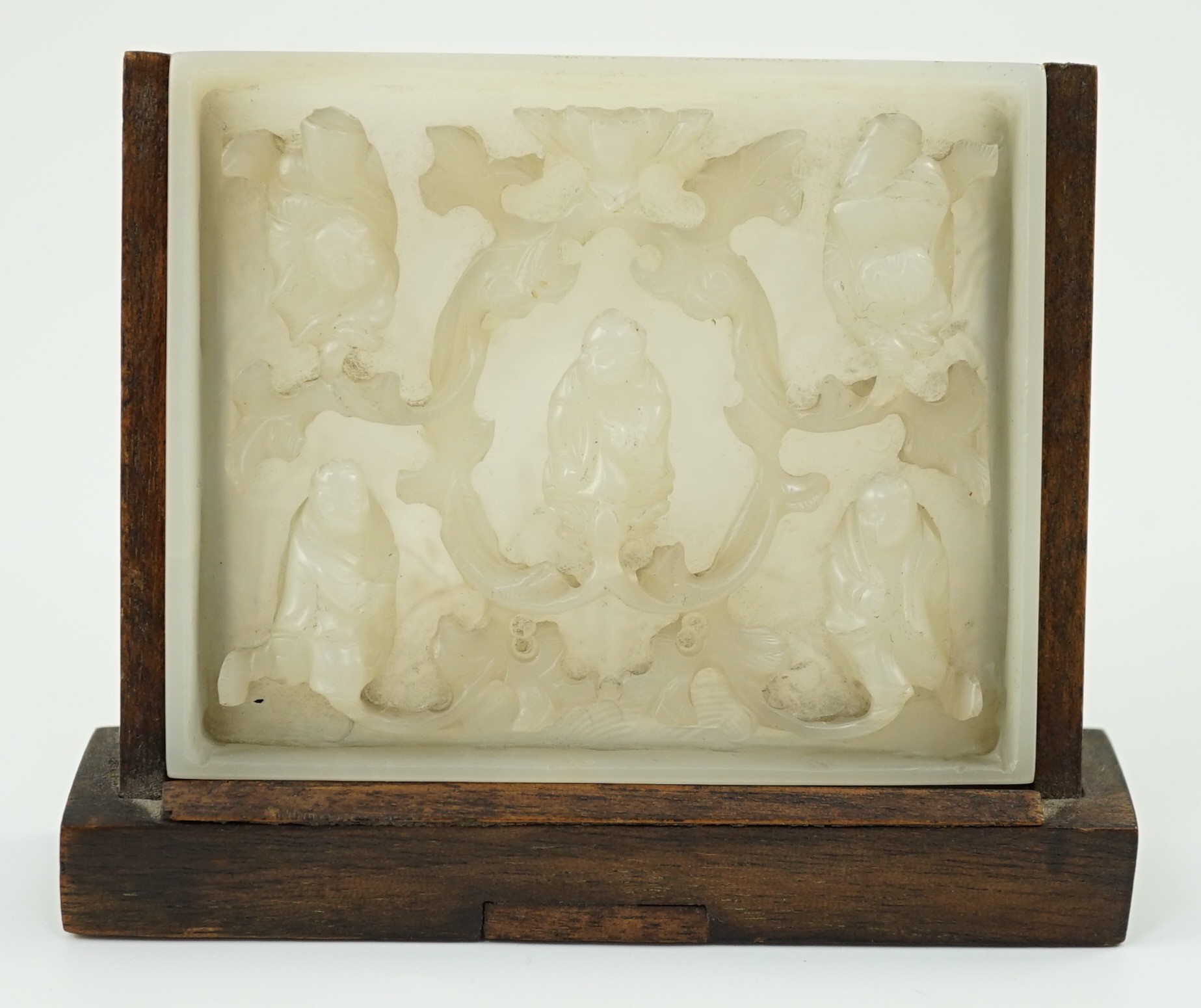 An unusual Chinese white jade plaque, 18th/19th century, carved in high relief with three seated - Image 2 of 4