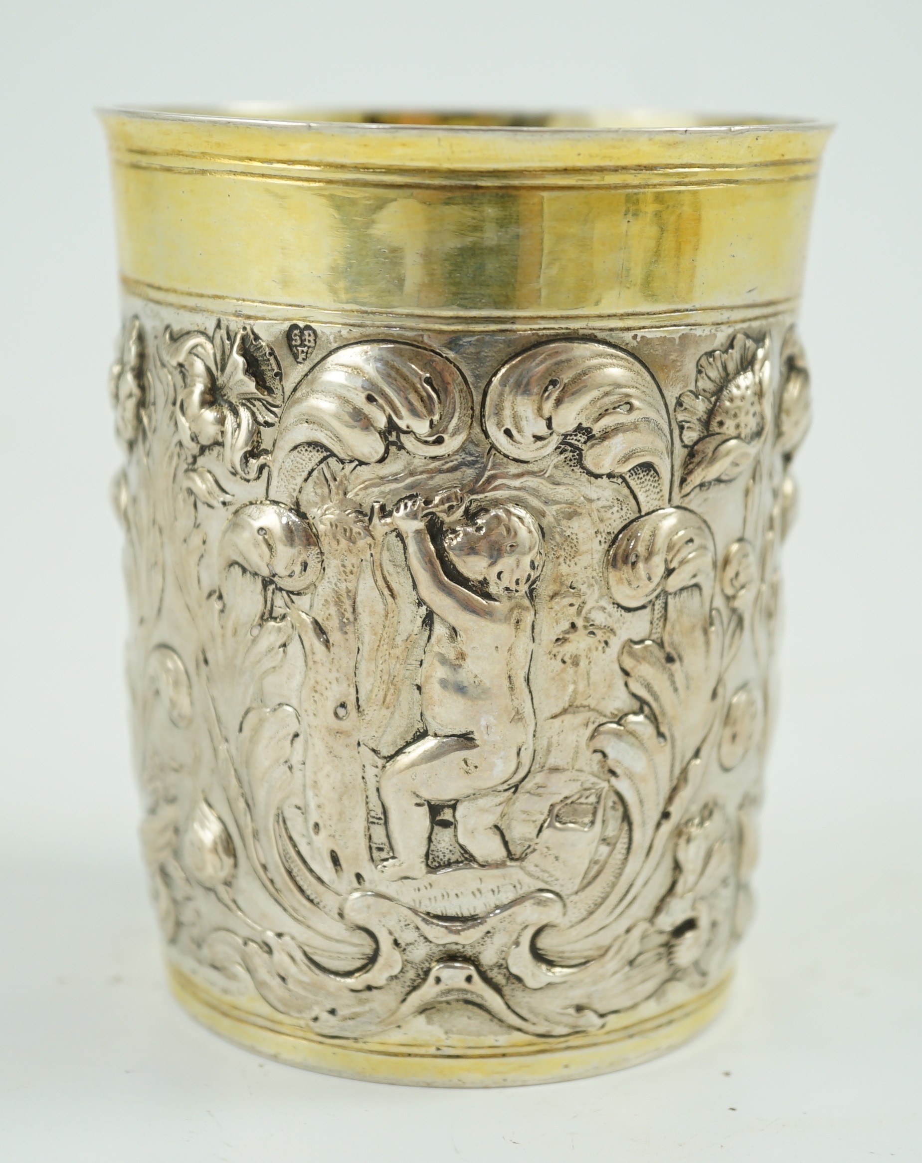 A late 18th century German embossed parcel gilt silver beaker, maker SBF, decorated with putti - Image 3 of 5