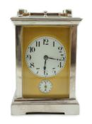 An early 20th century silver plated sonnerie carriage clock, with plain case, alarum and quarter