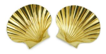 A cased pair of Elizabeth II silver gilt scallop shell butter dishes by Collingwood & Co, on shell
