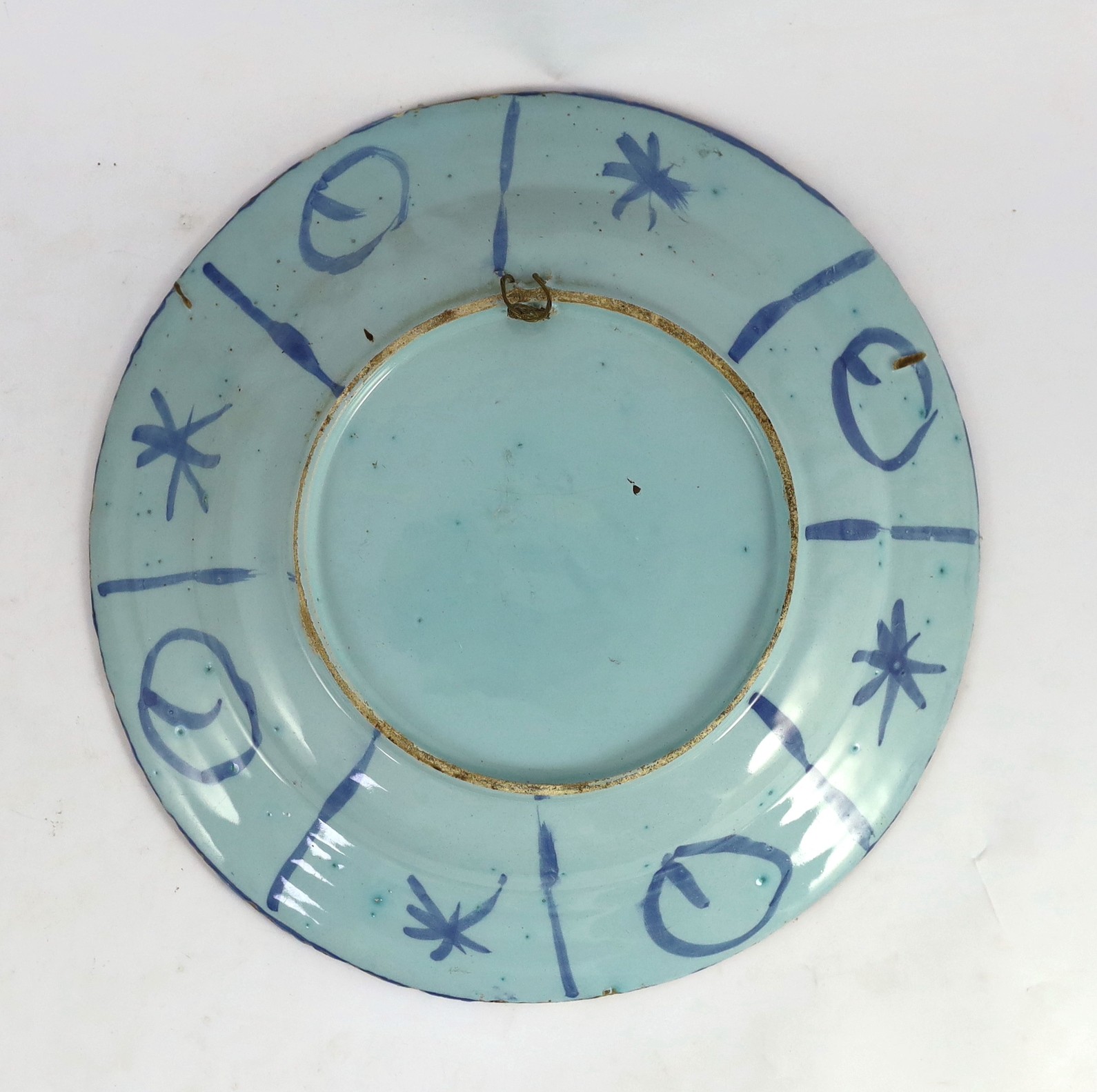 A Delft blue and white Kraak style dish, late 17th century, the centre painted with a Chinese figure - Image 2 of 2