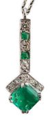 A 1920's platinum?, emerald and diamond set pendant necklace, the square cut emerald measuring 5.9mm
