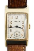A gentleman's 1930's 9ct gold Rolex manual wind rectangular dial wrist watch, on later leather