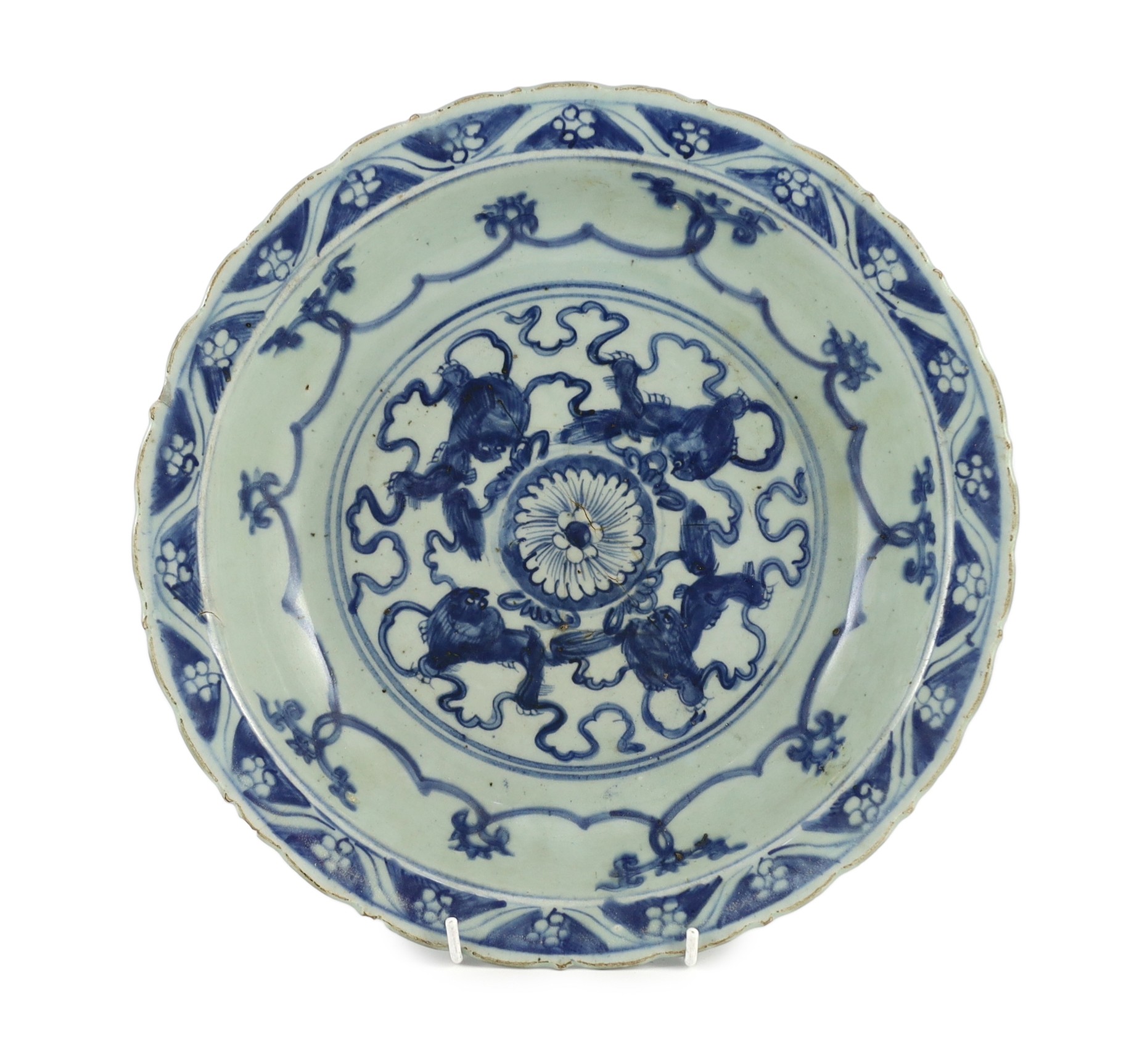 A Chinese Ming blue and white ‘lion’ dish, four character Ming mark, painted with four lions amid