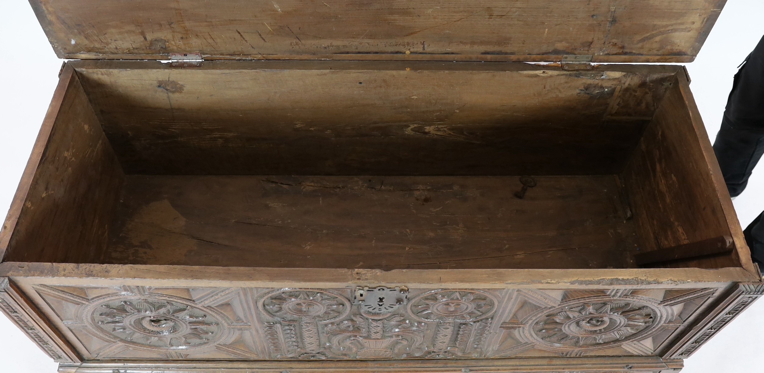 An 18th century Spanish chestnut coffer, carved in relief with a central fountain flanked by - Image 4 of 4