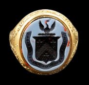 A Victorian 18ct gold and intaglio sardonyx set signet ring, the shank with engraved foliate