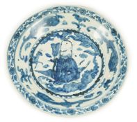 A large Chinese Swatow blue and white ‘Shou Lao’ dish, Zhangzhou kilns, Wanli period, the centre