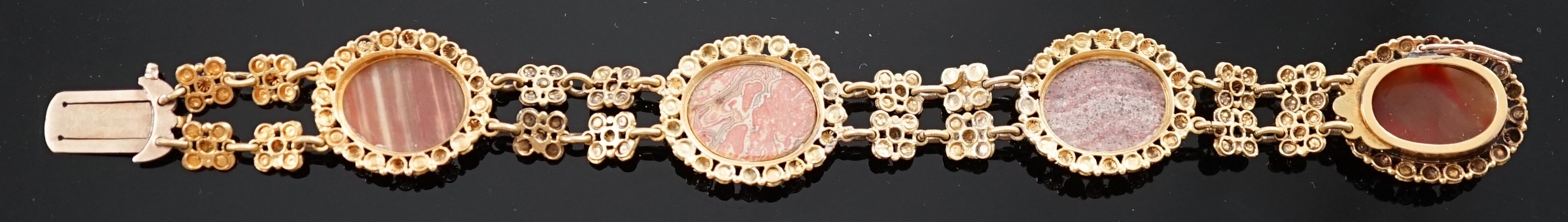 An early 19th century gold and four stone oval cabochon hardstone set bracelet, with flower head - Image 5 of 5