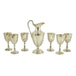 A modern cased silver ewer and six matching goblets by Courtman Silver Ltd, all with leaf