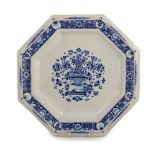 A large Strasbourg faience octagonal dish, c.1720-40, painted in blue with a basket of flowers,