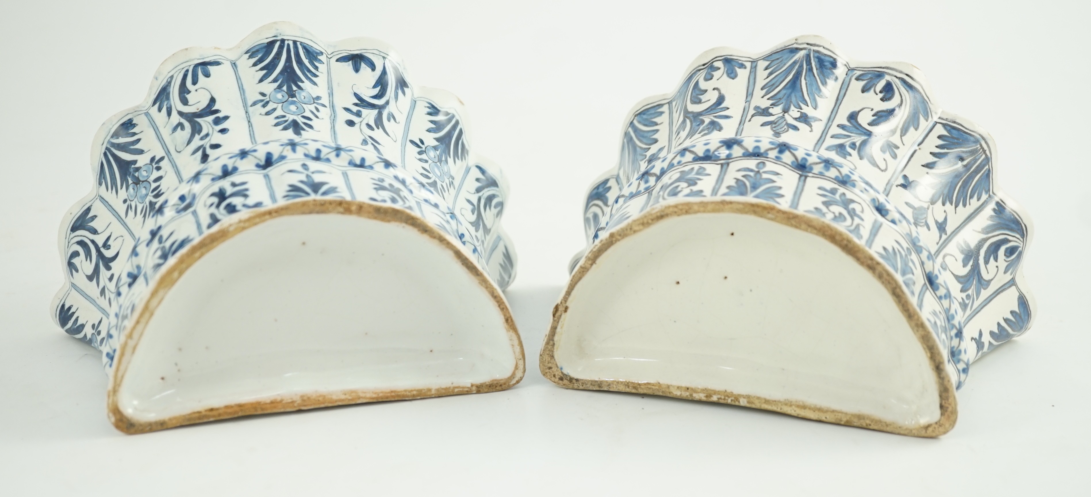 Two similar 18th century Delft blue and white hanging bough pots, of lobed demi-lune shape, - Image 7 of 7