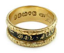 A George IV 18ct gold and black enamel 'In Memory Of' mourning band, with carved scroll border,