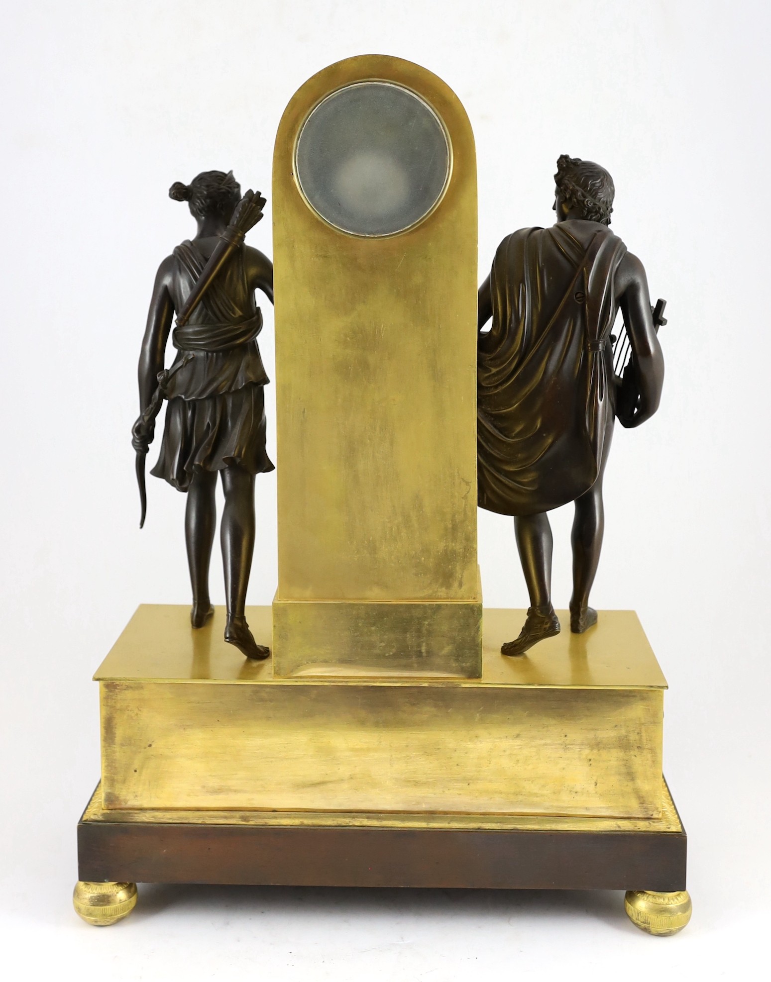 A 19th century French Louis XVI style bronze and ormolu mantel clock, surmounted with figures of - Image 4 of 5