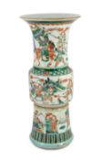 A Chinese famille verte beaker vase, gu, 19th century, painted with three continuous bands of