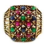 An Indian gold, ruby, sapphire and emerald cluster set dress ring, with rope twist shoulders, size