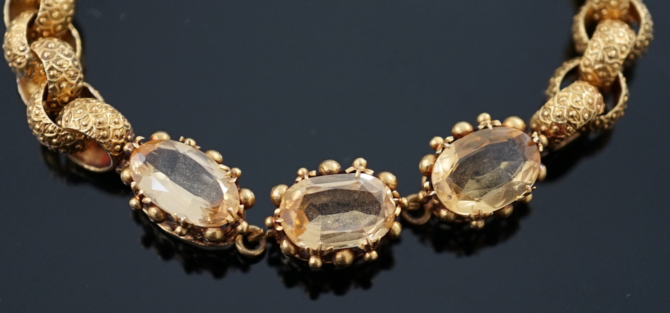 A 19th century cannetille work gold and four stone oval cut citrine set circular link bracelet, - Image 3 of 6