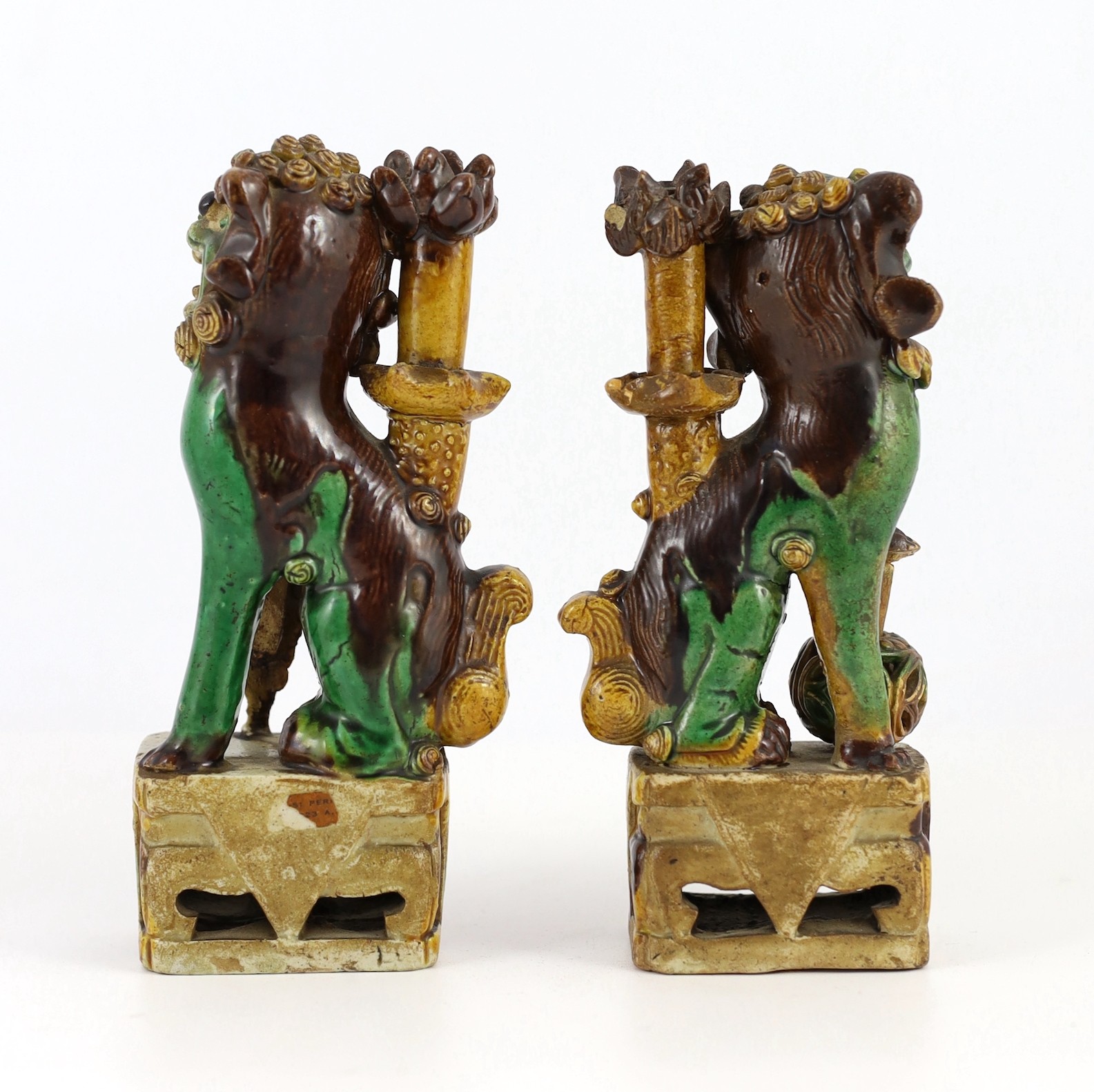 A pair of Chinese sancai-glazed biscuit Buddhist lion joss stick holders, Kangxi period, 15.5 and - Image 2 of 5