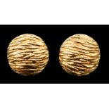 A modern pair of Kutchinsky 18ct gold cufflinks, of textured circular domed form, signed, diameter