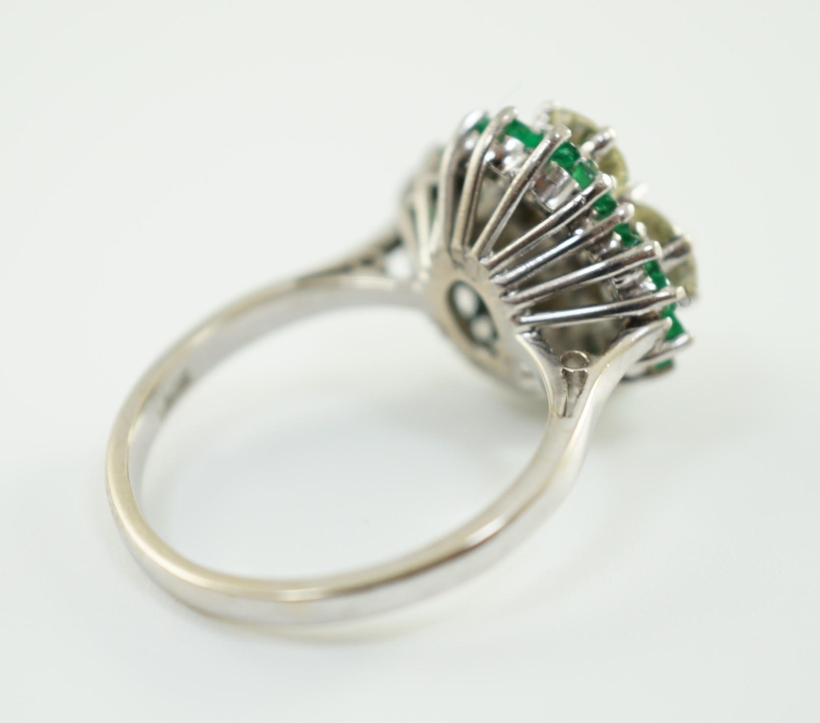 An 18ct white gold, emerald and diamond cluster set dress ring, the four diamonds with a total - Image 3 of 4