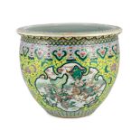 A Chinese enamelled porcelain goldfish bowl, late 19th century, painted to shaped reserves with