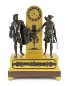 A 19th century French Louis XVI style bronze and ormolu mantel clock, surmounted with figures of