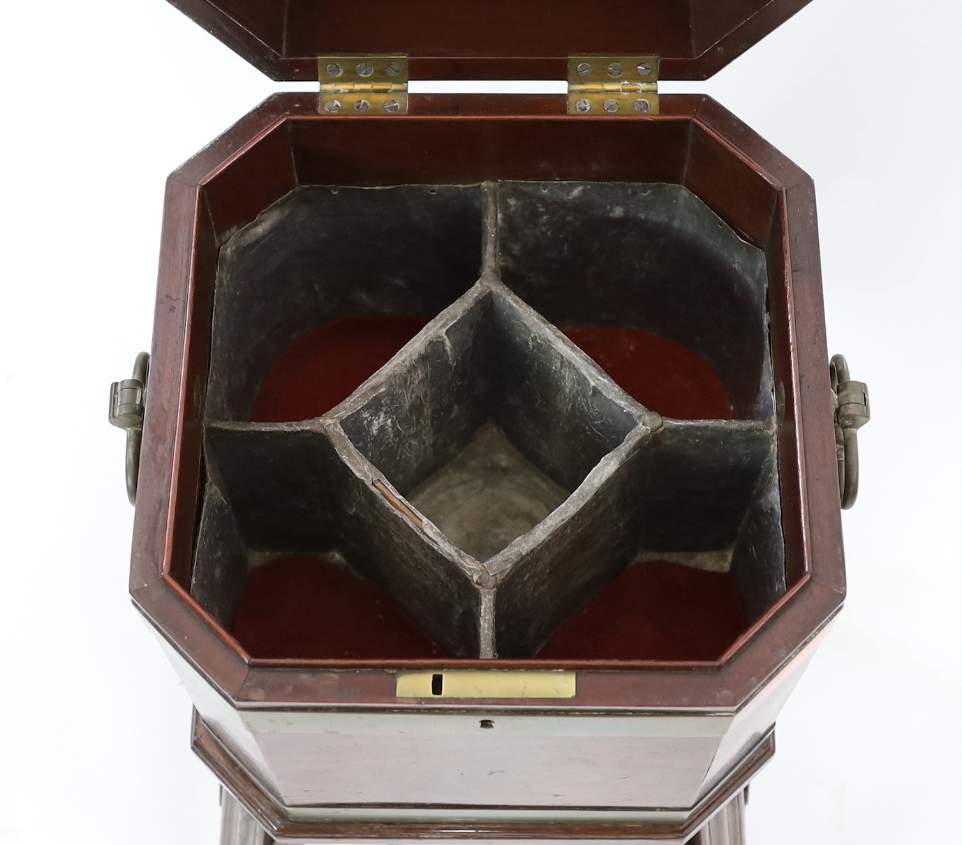 A George III brass bound mahogany cellaret, of octagonal form, with loop handles and lead lined five - Image 2 of 4