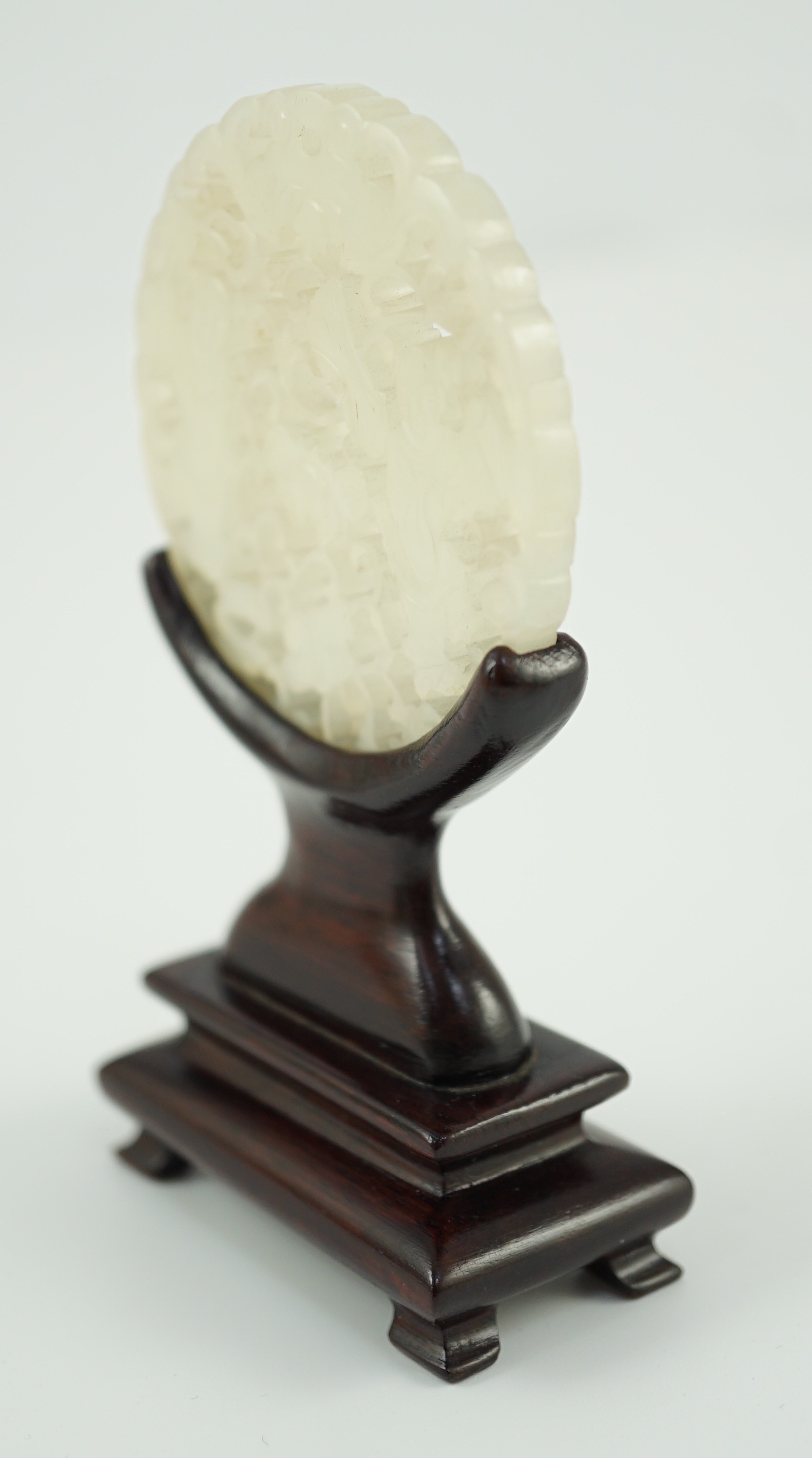 A Chinese white jade ‘Hehe Erxian’ disc, 19th/20th century, carved and pierced with a bat above - Image 5 of 5
