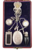 A cased Victorian silver chatelaine by Henry William Dee, London, 1874, comprising a mirror,