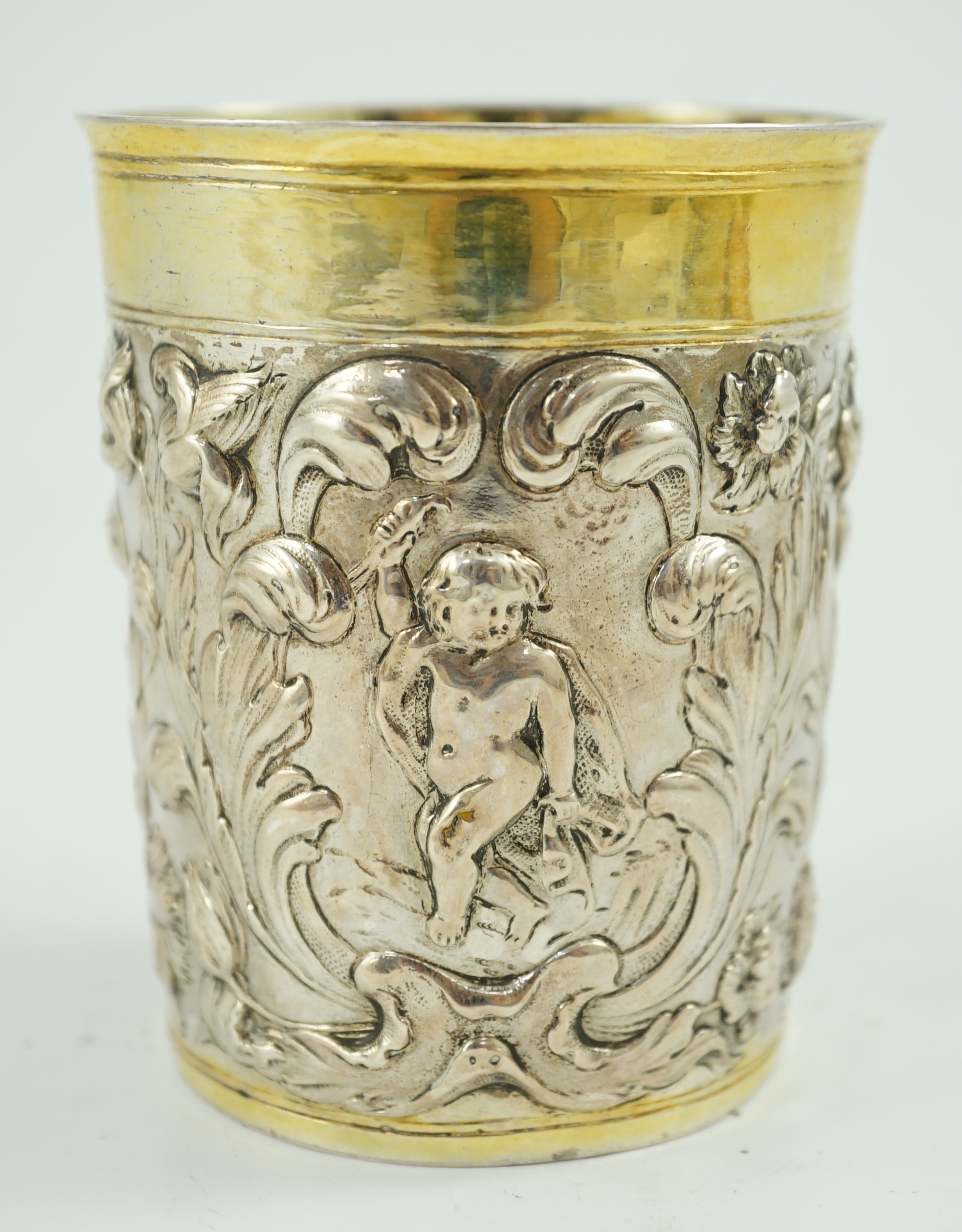 A late 18th century German embossed parcel gilt silver beaker, maker SBF, decorated with putti - Image 4 of 5