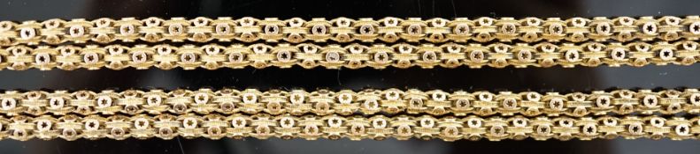 A 19th century gold guard chain, with star cut and reeded links, 158cm, 55.1 grams.***CONDITION