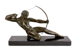Salvator Riolo. An Art Deco patinated spelter figure of an archer, kneeling with bow string drawn