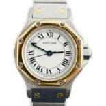 A lady's modern steel and gold Cartier Santos Ronde manual wind wrist watch, on Cartier bracelet