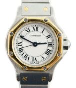 A lady's modern steel and gold Cartier Santos Ronde manual wind wrist watch, on Cartier bracelet