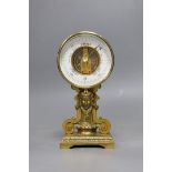 A gilt metal aneroid barometer classical design, 19cms high