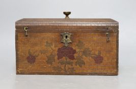 A late 19th century incised and painted tea caddy with floral brick decoration. 24cm wide