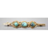 A 750 yellow metal and three stone shaped turquoise set bar brooch, 57mm, gross weight 6.6 grams.