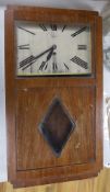 An Art Deco walnut cased electric wall clock, signed Ingersoll Electronome, 57cms high