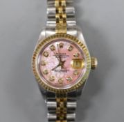A lady's 2015 steel and gold Rolex Oyster Perpetual Datejust wrist watch, with pink mother of