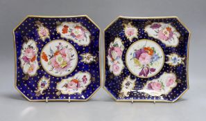 A pair of Coalport ground blue and gilt porcelain square dishes, c.1815-20, with floral panelled