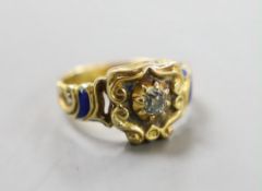 An early 19th century yellow metal (stamped 18), enamel and old cut diamond set ring, size J,